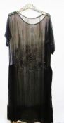 A black 1920's/30's chiffon and beaded dress