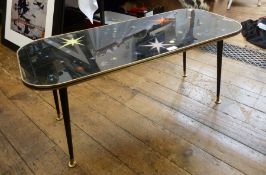 1950's hardwood coffee table, glass and lacquer surface, star decoration (af), height 41cm and a