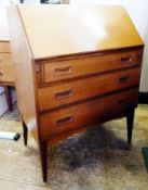 Mid 20th century oak bureau, comprising three long drawers, hinged fall flap, containing pigeon