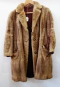 A vintage fur coat possibly musquash
