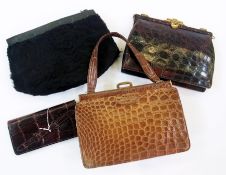 A vintage brown fixed frame crocodile handbag, another, lacking handle, but with a matching purse,