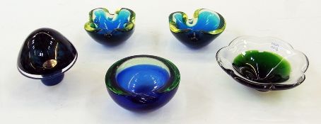 A Wedgwood blue glass paperweight in the form of a mushroom, two matching art glass ashtrays and two