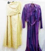 Gold-colour off-the-shoulder evening gown and a purple shot taffeta gown with jacket, circa 1940's/