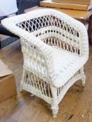 Cane open arm garden chair with shaped tub back, trellis pattern canework with underskirt