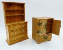 Miniature Oriental-style hardwood chest of four drawers, cupboard-fronted, height 25.5cm and a