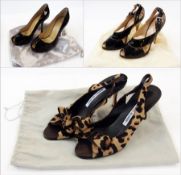 A pair of Manolo Blahnik leopard print sandals, high-heeled, sling-backs in original dust bag,