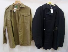 A large selection of army combat shirts and a blue pea jacket, double breasted (10)