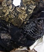 A velvet and beaded long sleeve top, a black net and gold plated decorated top and other part
