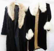 A knitted black evening coat with fox collar and a vintage velvet evening coat with white fox collar