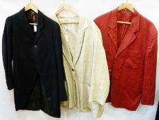 A gentleman's  black wool morning coat, a  gentleman's red linen jacket and a gentleman's cream