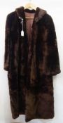 A vintage fur coat, beaver, labelled "Gertrude Harris, New Bond Street"