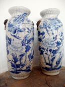 A pair of Chinese blue and white crackleware cylindrical vases (2)