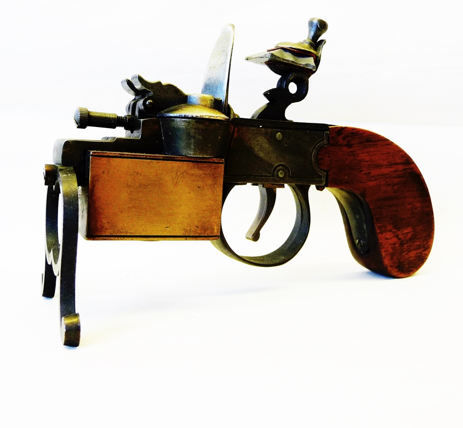 Mid-20th century table lighter by Dunhill in the form of a flintlock tinderbox pistol