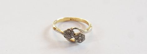 18ct and diamond cluster ring in flower-shaped setting