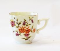 Mid 18th century Derby quatrefoil coffee cup, with incuse corners, pointed scroll handle, painted