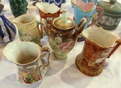 Two Price cottageware large jugs, Majolica jug, two other jugs and a coloured vase (6)
