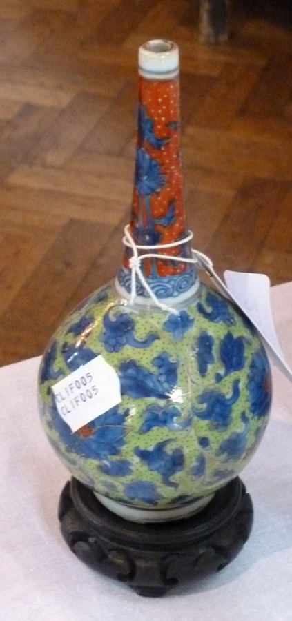 Chinese porcelain vase, painted in red, green and blue with underglaze blue lotus leaf mark to base,