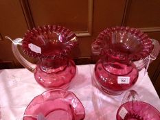 Pair large Victorian cranberry  and clear glass jugs, each with frilled everted rim, waisted neck,