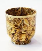 Mid 18th century Staffordshire agate ware pot, cylindrical, on slightly flared foot, circa 1750