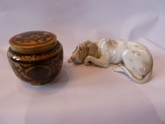 Lladro model of a bassett hound, 26cm long and a ginger jar in ochre colour with dark brown