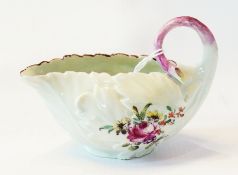 Mid 18th century Derby cream boat, foliate moulded with scroll branch handle, painted with two small