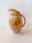Bursley Ware Charlotte Rhead jug, with incised relief decoration of fruit and flowers, mark to base,