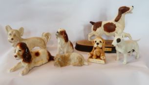 Quantity of sylvac and other pottery and porcelain models, in the form of dogs (7)