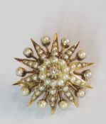 Antique gold, seed pearl and diamond pendant/brooch, starburst pattern, centred by solitaire