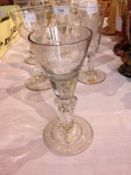 Georgian wine glass  with air bubble to the base of the tapering bowl, moulded panelled stem with