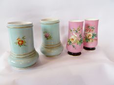 Pair of continental tapered vases, pink ground with white rose decoration and another pair of blue