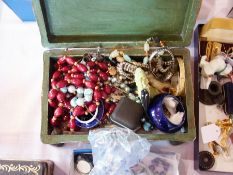 A quantity of costume jewellery to include a quantity of pendants, beaded necklaces, watches (in