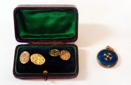 A pair of 9ct gold cufflinks, scroll engraved in fitted case and a gold-coloured and blue enamel