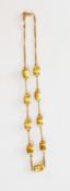 18ct gold chain necklace with beads, 15.4g approx.