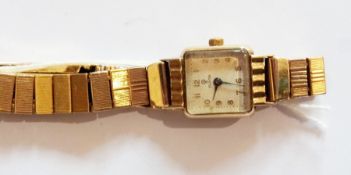 A lady's Tudor 9ct gold wristwatch, square dial, with chain-link expanding bracelet