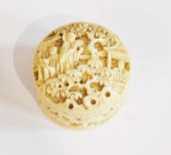 A Chinese Canton carved ivory pillbox, circular, decorated with figures in landscape. 3.5cm