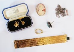 A gold plated bracelet, ten shilling pendant on chain, two tie studs, marcasite ring, cameo brooch