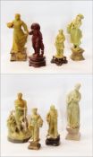 Eight Chinese soapstone figures, four large green soapstone figures, three smaller green soapstone