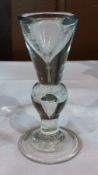 Early 18th century Toastmasters glass, circa 1710 with round funnel bowl bulbous taping knot with