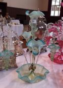 Victorian turquoise green and clear vasoline glass epergne having central flute, two further