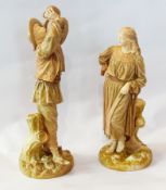 Pair Royal Worcester Hadley figures, decorated in matt gold, green and peach, the male figure