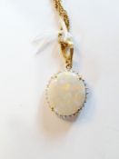 14ct gold, opal and diamond cluster pendant, set large oval opal, surrounded by smaller diamonds, on