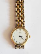 A lady's Omega De Ville wristwatch with enamel dial and steel and gold-coloured metal bracelet