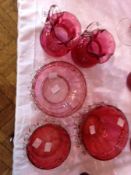 Three cranberry and clear sugar bowls with applied clear glass frills and two cranberry clear