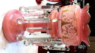 Victorian pink and clear opaque glass lustre, having shaped everted rim, floral and gilt painted,