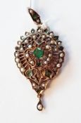 Gold-coloured metal, emerald and pearl pendant, the pierced, shaped circular pedant set with central