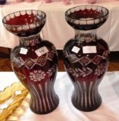 Pair ruby and clear flashed and cut glass vases, each with thumb-nail cut raised rim, shouldered,