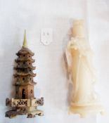 Oriental soapstone figure of Kuan Yin, 23cm high and a soapstone model of a pagoda on hexagonal