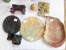 A quantity of soapstone items to include:- an oriental lotus leaf shaped dish, with engraved