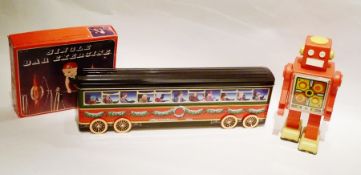 Modern tinplate car, "Acqua E Sheone" and other tin biscuit tins (1 box)