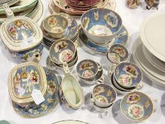 Early 19th century part china teaset, blue ground with gilt border, floral painted with naturalist